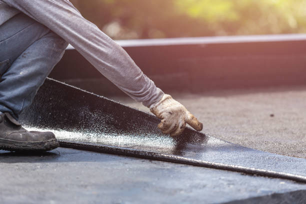 Professional Basement Waterproofing technician working in Iola, WI
